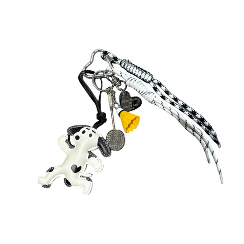 BIJOU DE SAC BS450 CHIEN NOIR ET BLANC BADMINTON